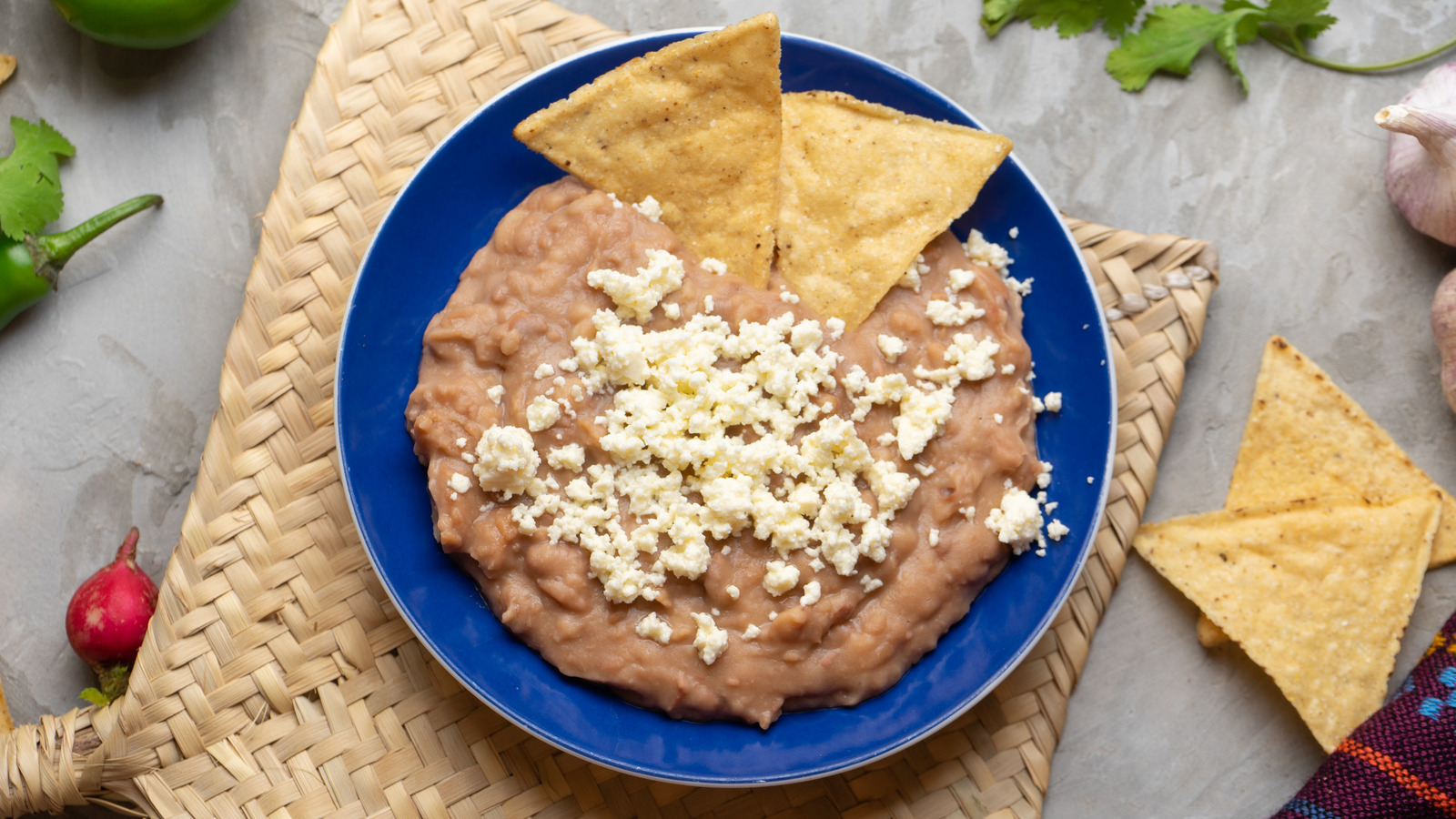 Should You Add Milk Or Water To Refried Beans? It Makes A Difference