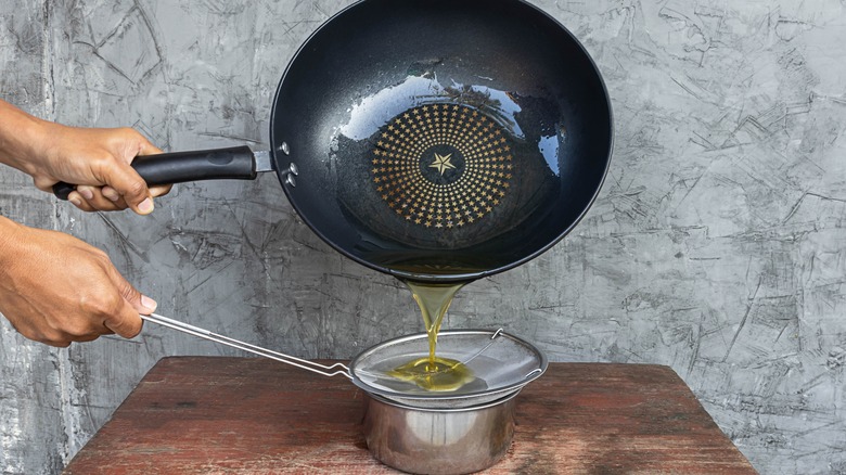 Straining used cooking oil