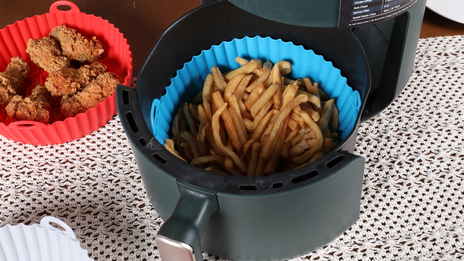 <a href="https://www.foodrepublic.com/1833870/should-use-liner-in-air-fryer/" target="_blank">Should You Be Using A Liner In Your Air Fryer?</a>