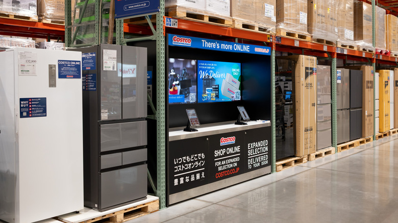 Aisle of large appliances inside Costco