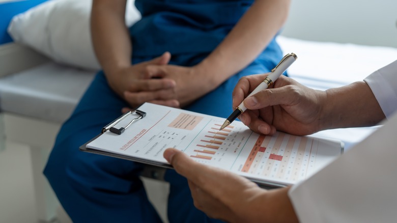 Doctor with chart