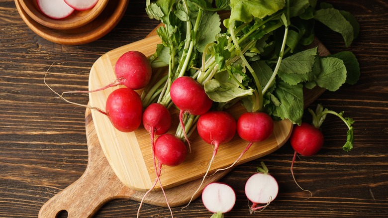 Radishes on a cutting board