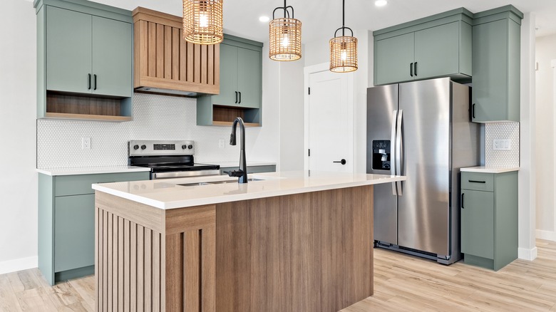 A kitchen island with a sink