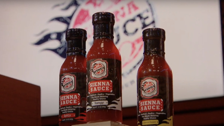 Bottles of Sienna Sauce on Shark Tank set