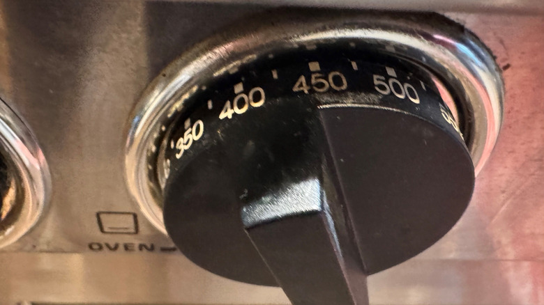 Oven temperature knob set to 450 F
