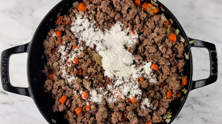 Ground lamb mixture with flour on top