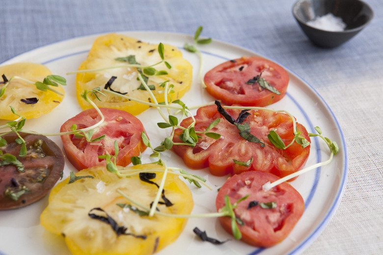 Great tomatoes don't need much to shine on the plate. Grab some extra-virgin olive oil and make it happen.