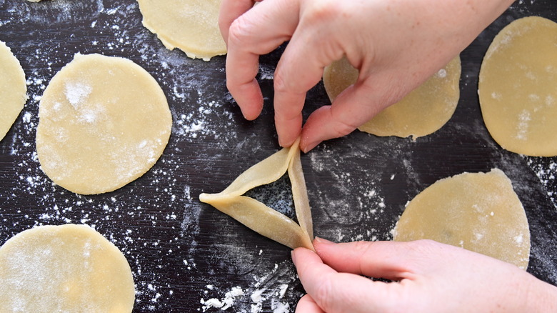 Preparing sesame hamantaschen