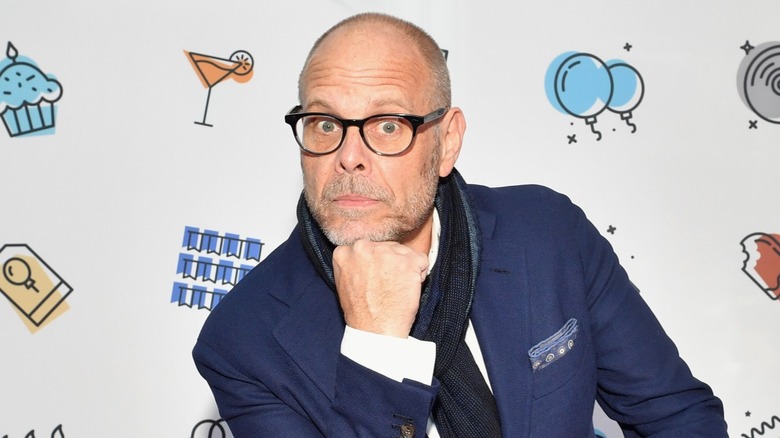 Alton Brown posing pensively for the camera