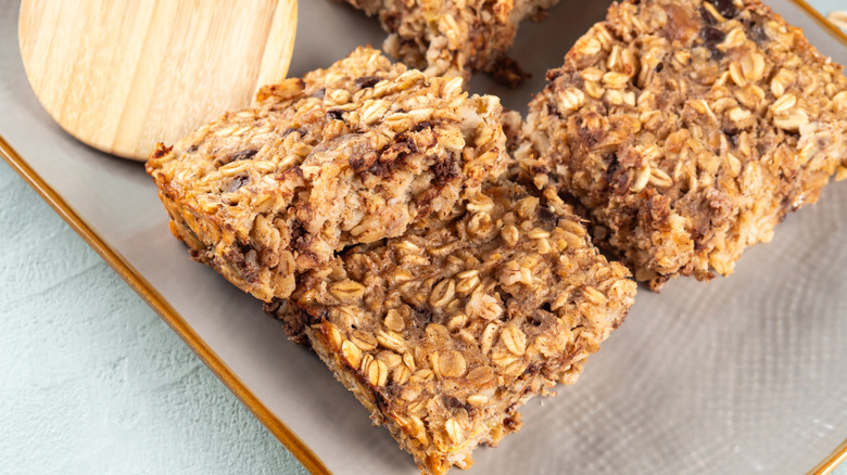 Banana oat bars on a paper-lined tray
