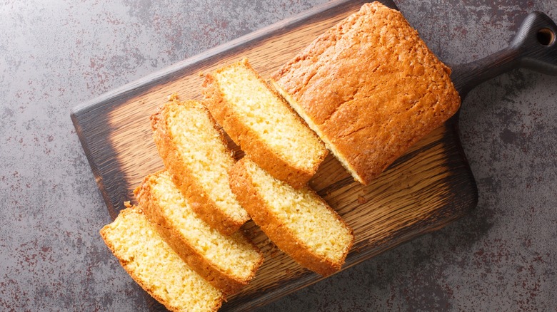 Sliced pound cake on a wooden tray