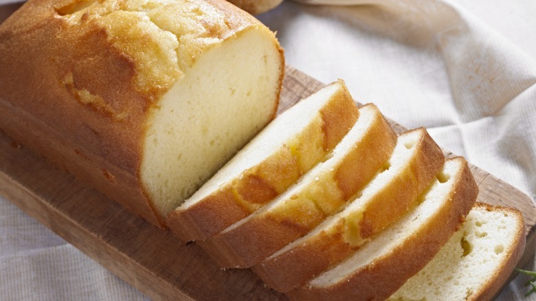 Sliced pound cake on a cutting board