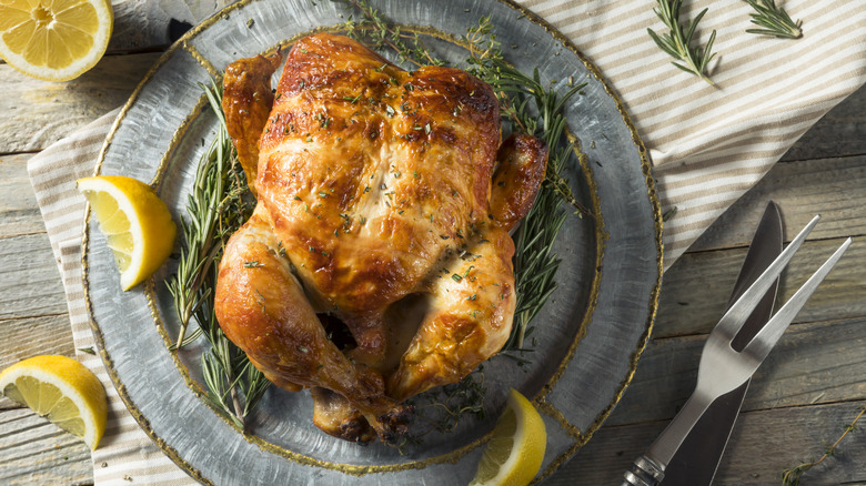 Homemade rotisserie chicken with lemon and herbs
