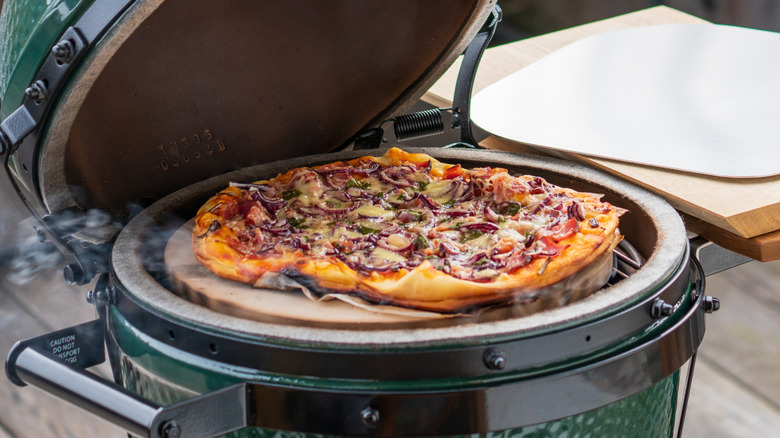 Pizza on an outdoor grill