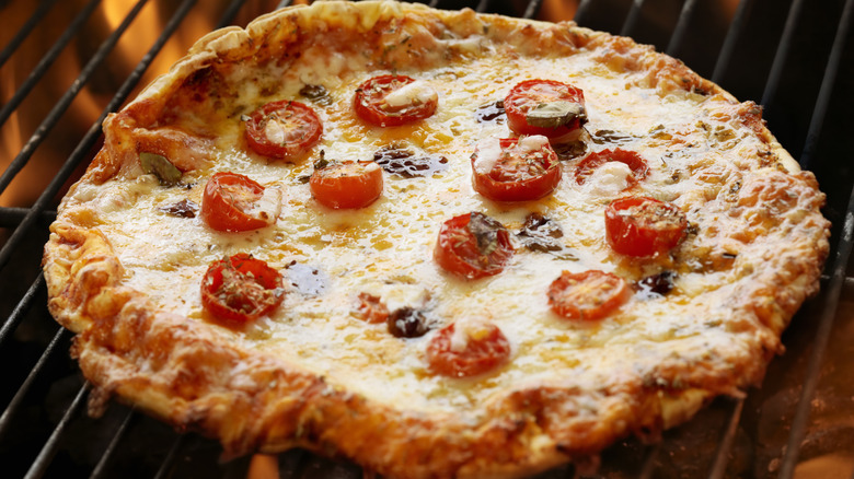 Pizza cooked on grill