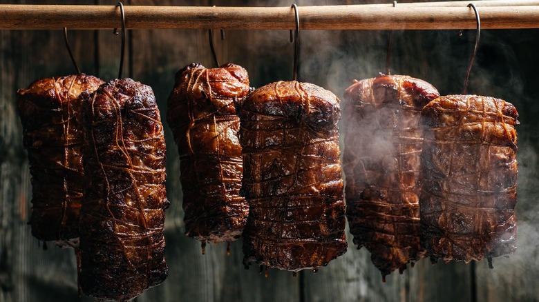 Cured meat in smokehouse