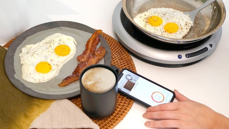 Ember mug with phone and breakfast