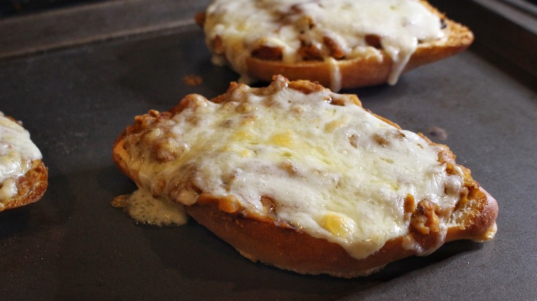 rolls with beans and melted cheese