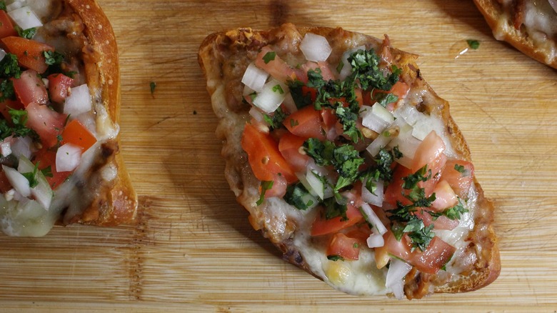 molletes on cutting board