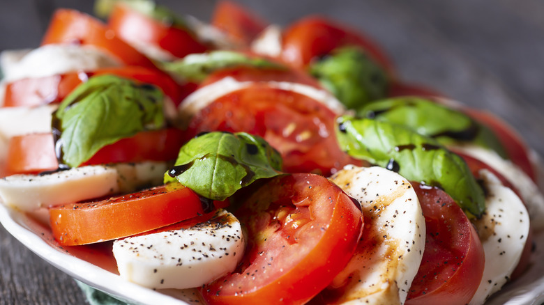 Caprese salad with tomatoes, basil, and mozzarella