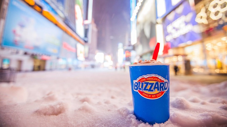 Photo of a Dairy Queen blizzard placed in snow in an outdoor setting