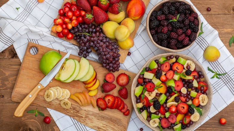 lots of fruit and a bowl of fruit salad