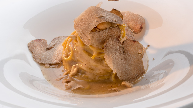Tagliolini topped with sliced white truffles