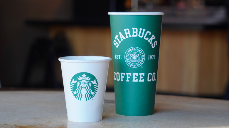 Starbucks 1971 Roast in Short cup and special-edition green Venti cup