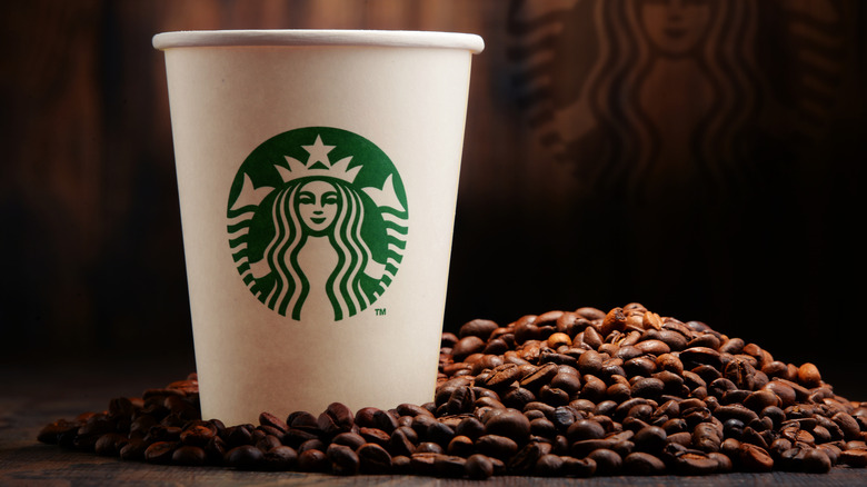 Starbucks cup and beans