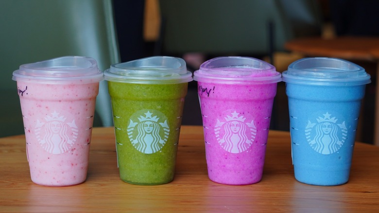 Starbucks' Blended Pink Drink, Blended Matcha Lemonade, Blended Mango Dragonfruit Lemonade, and Blended Ocean Drink (left to right).