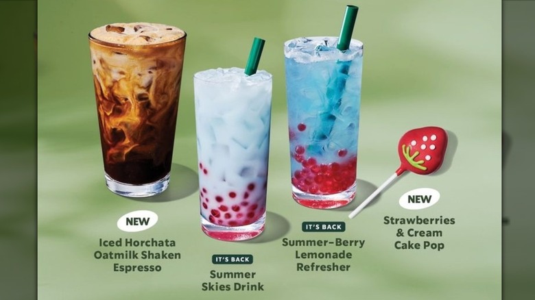 Images of items from Starbucks' new summer 2025 menu against a green background: Iced Horchata Oatmilk Shaken Espresso, Summer Skies Drink, Summer-Berry Lemonade Refresher, and Strawberries & Cream Cake Pop