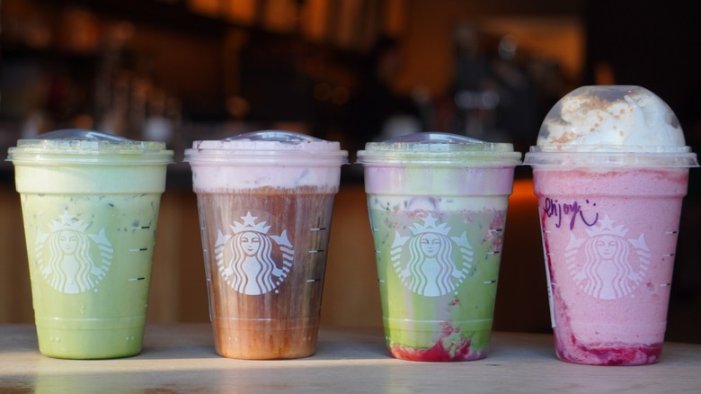 Starbucks Iced Banana Bread Matcha, White Chocolate Strawberry Cream Cold Brew, Iced Double Berry Matcha, and Strawberry Shortcake Frappuccino (left to right)