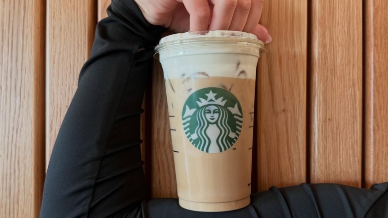 An iced latte topped with cold foam.