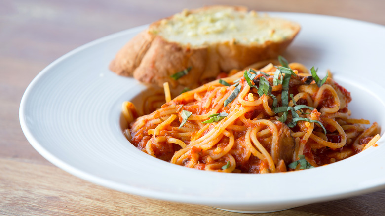 Tomato pasta with crusty bread