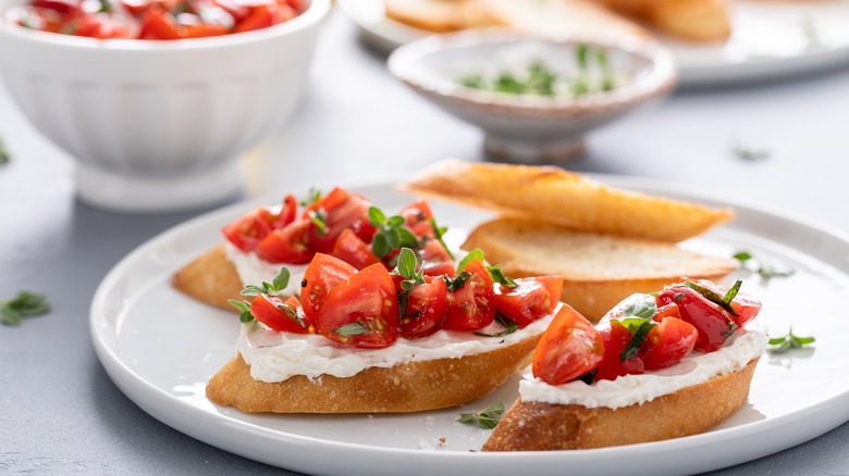 Italian bruschetta with tomatoes and herbs