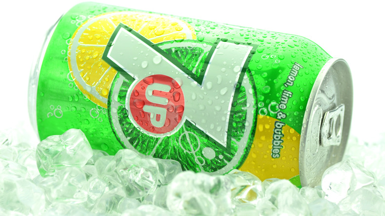 Can of 7 Up soda on a bed of ice