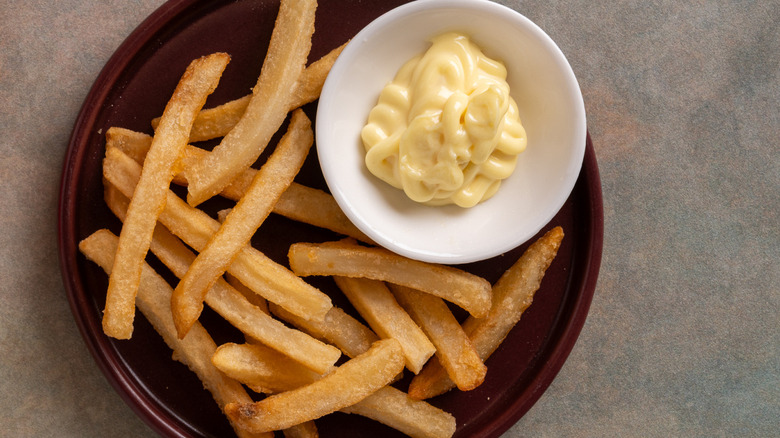 bowl of mayo and fries