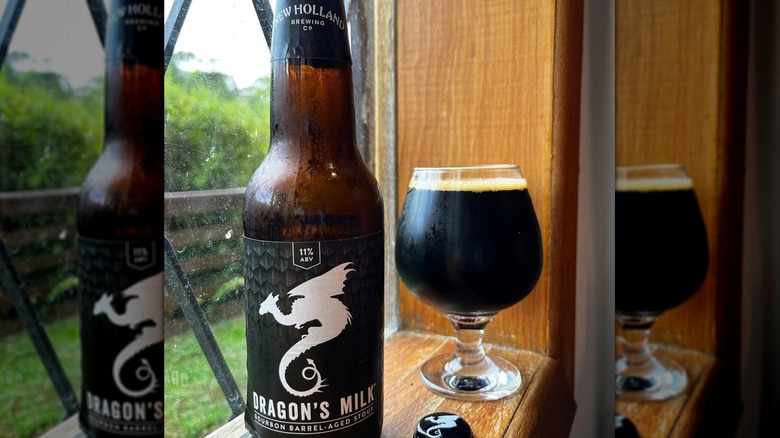 Bottle and glass of Dragon's Milk Bourbon Barrel-Aged Stout