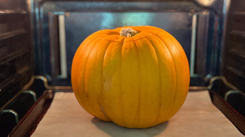 Stuffed pumpkin in oven