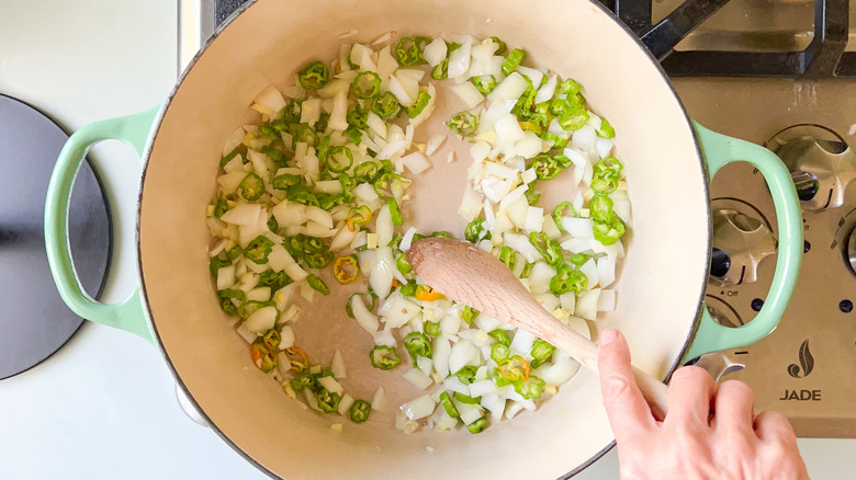 Aromatic vegetables cooking in pot