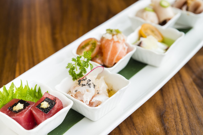 Sushi Roku's signature sashimi sampler features six creative spins on raw fish. (Photo courtesy of Sushi Roku.)