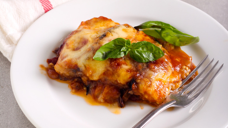 Eggplant parmesan garnished with basil