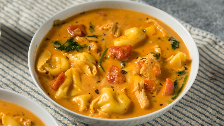 creamy tortellini soup in a bowl