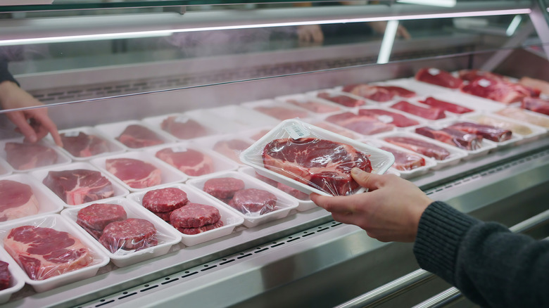 A supermarket's refrigerated meat display.