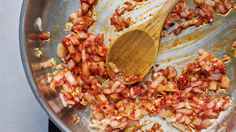 saucy vegetables in skillet