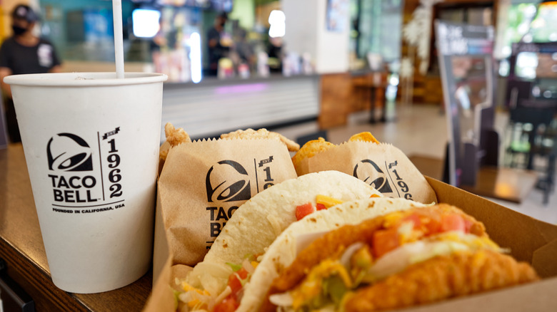 Taco Bell Cravings Box with two tacos, two sides, and  a drink