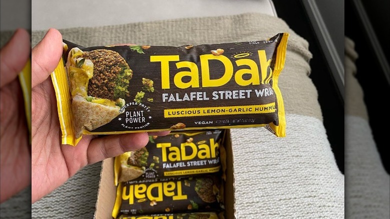 Someone holding TaDah wraps