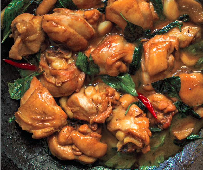 A crazy amount of garlic, ginger and Thai basil guarantees you some super flavorful chicken.
