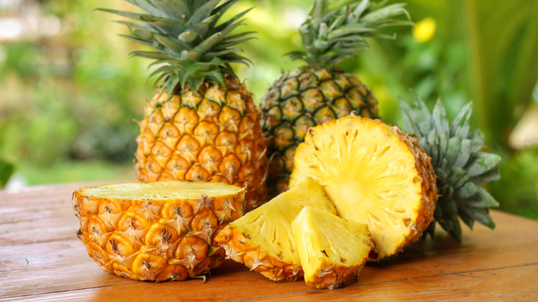whole and cut pineapple 