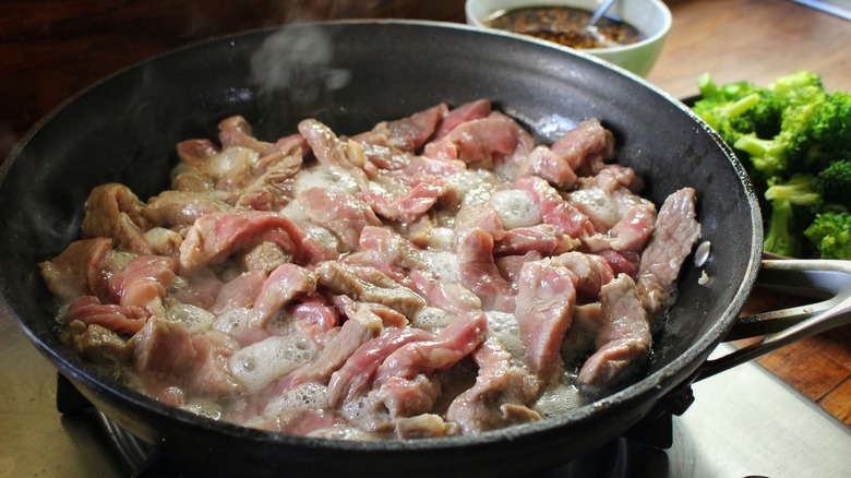 beef strips in frying pan